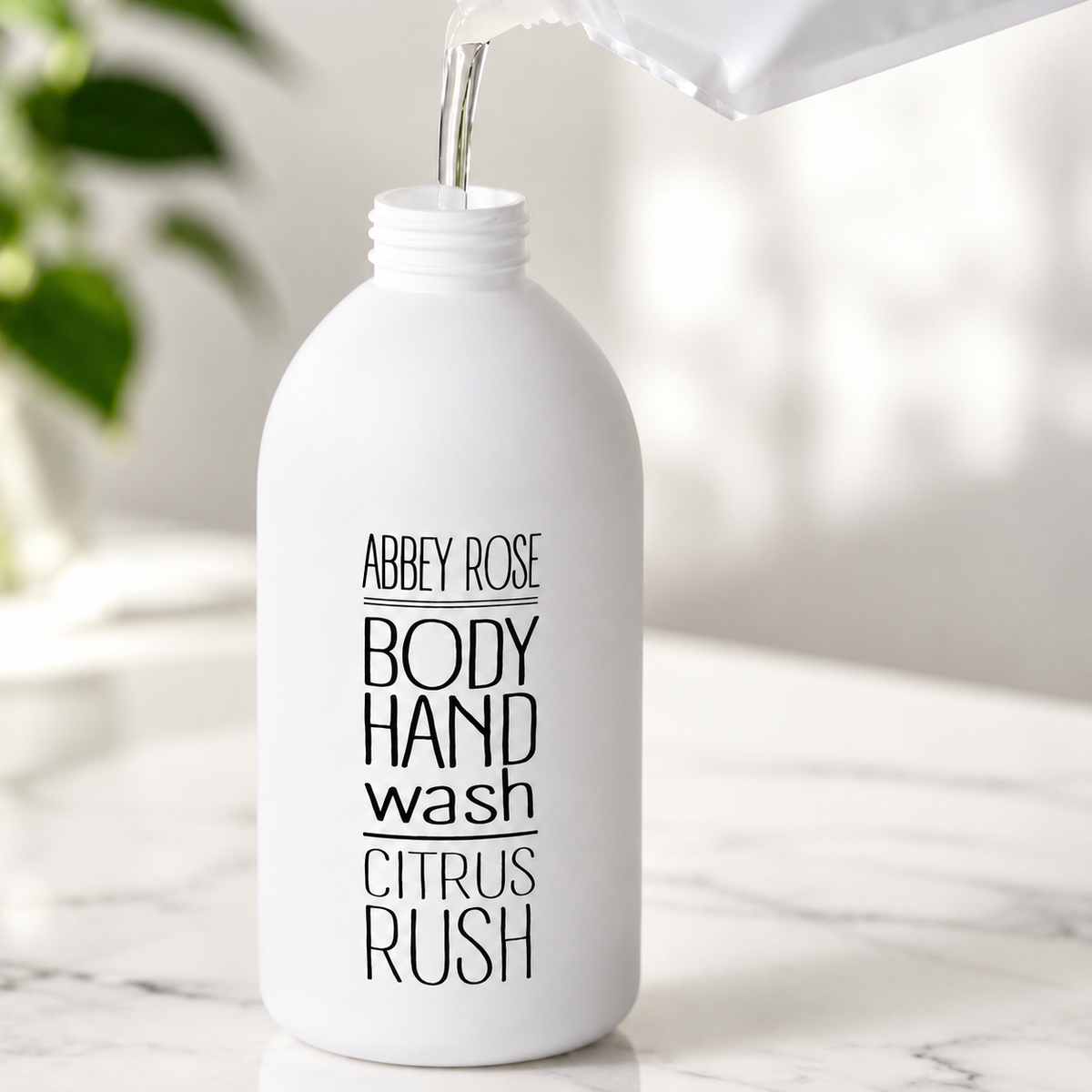 Citrus Rush and Jasmine, Patchouli & Vanilla organic body wash refill bottles side by side - Abbey Rose New Zealand