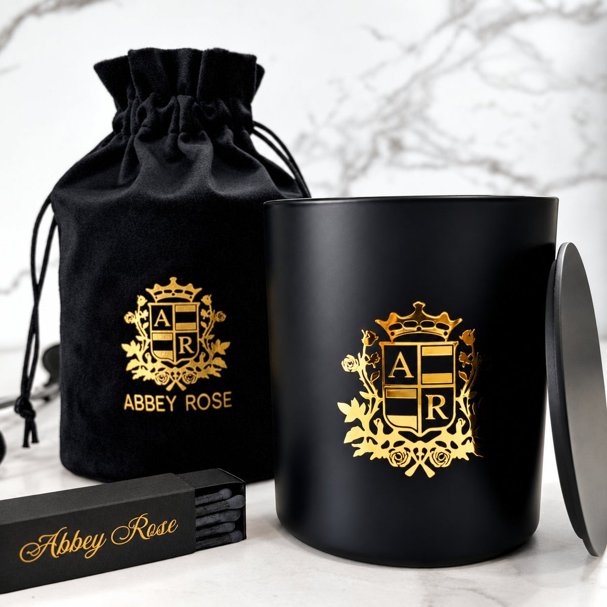 Abbey Rose black candle jar with gold crest and velvet gift pouch – NZ made